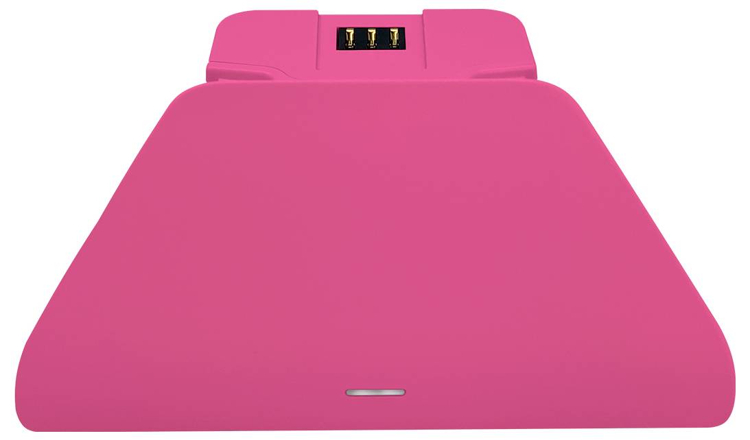 Ein rosa, dreieckig geformtes Objekt mit einer elektronischen Komponente auf der Oberseite, das drei goldene Anschlüsse in der Mitte aufweist.