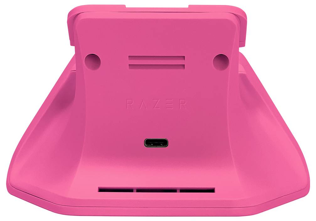 Ein rosa Gaming-Controller-Ladestativ mit einem Verbindungsschlitz an der Basis, entwickelt zum aufrechten Halten und Laden von Controllern.