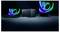 Ein Laptop, ein Desktop-Tower und ein Monitor mit leuchtenden Razer-Logos werden zusammen vor einem dunklen Hintergrund angezeigt.