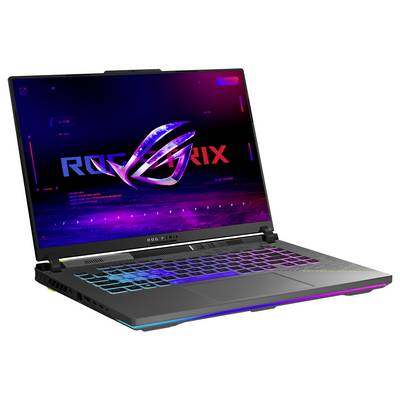 Offener Gaming-Laptop mit ROG-Logo auf einem neonblau und neonrosa leuchtenden Bildschirm, mit RGB-beleuchteter Tastatur.