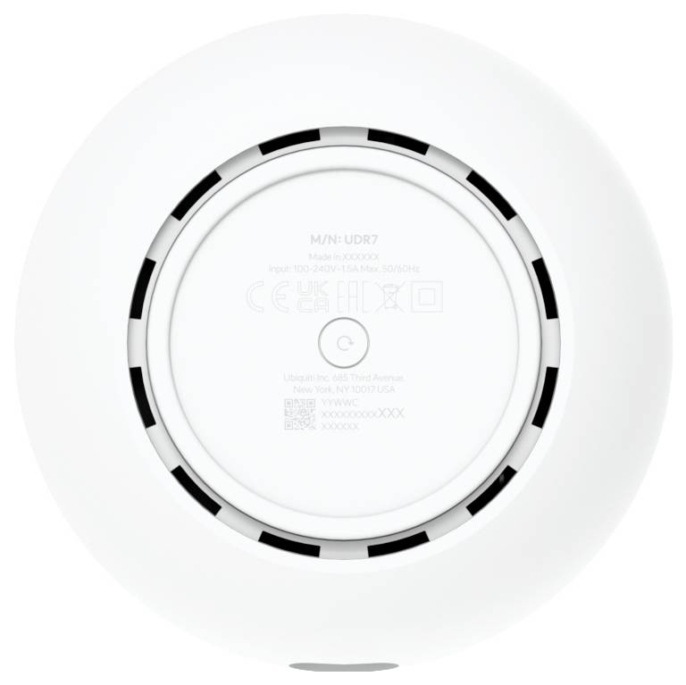 Rundes Gerät mit der Modellnummer „M/N: UDR7". Der Text enthält die Eingangsspannung „100-240V" und „50/60Hz", mit einem Logo in der Mitte.