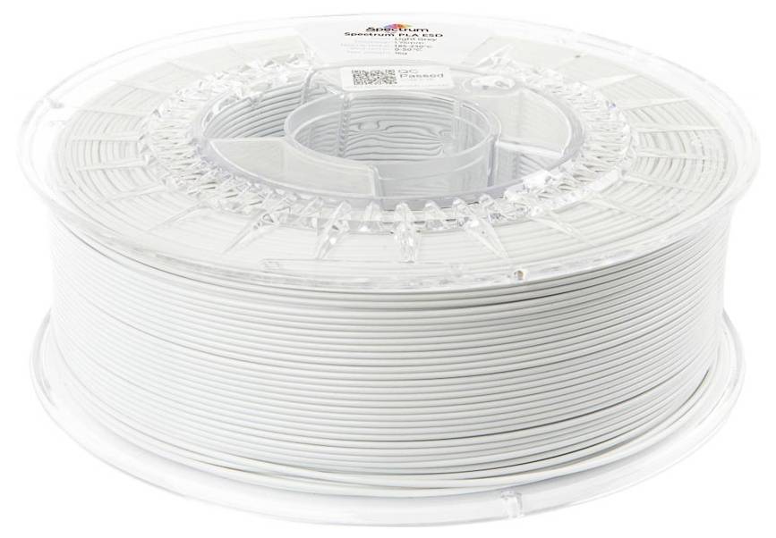 Leere Spule mit weißem 3D-Druckerfilament auf einer transparenten Kunststoffspule auf weißem Hintergrund.