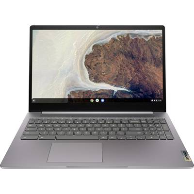 Ein Laptop zeigt eine Luftaufnahme einer rauen Küstenlinie auf seinem Bildschirm. Das Gerät ist geöffnet und zeigt eine vollständige Tastatur und ein Touchpad.