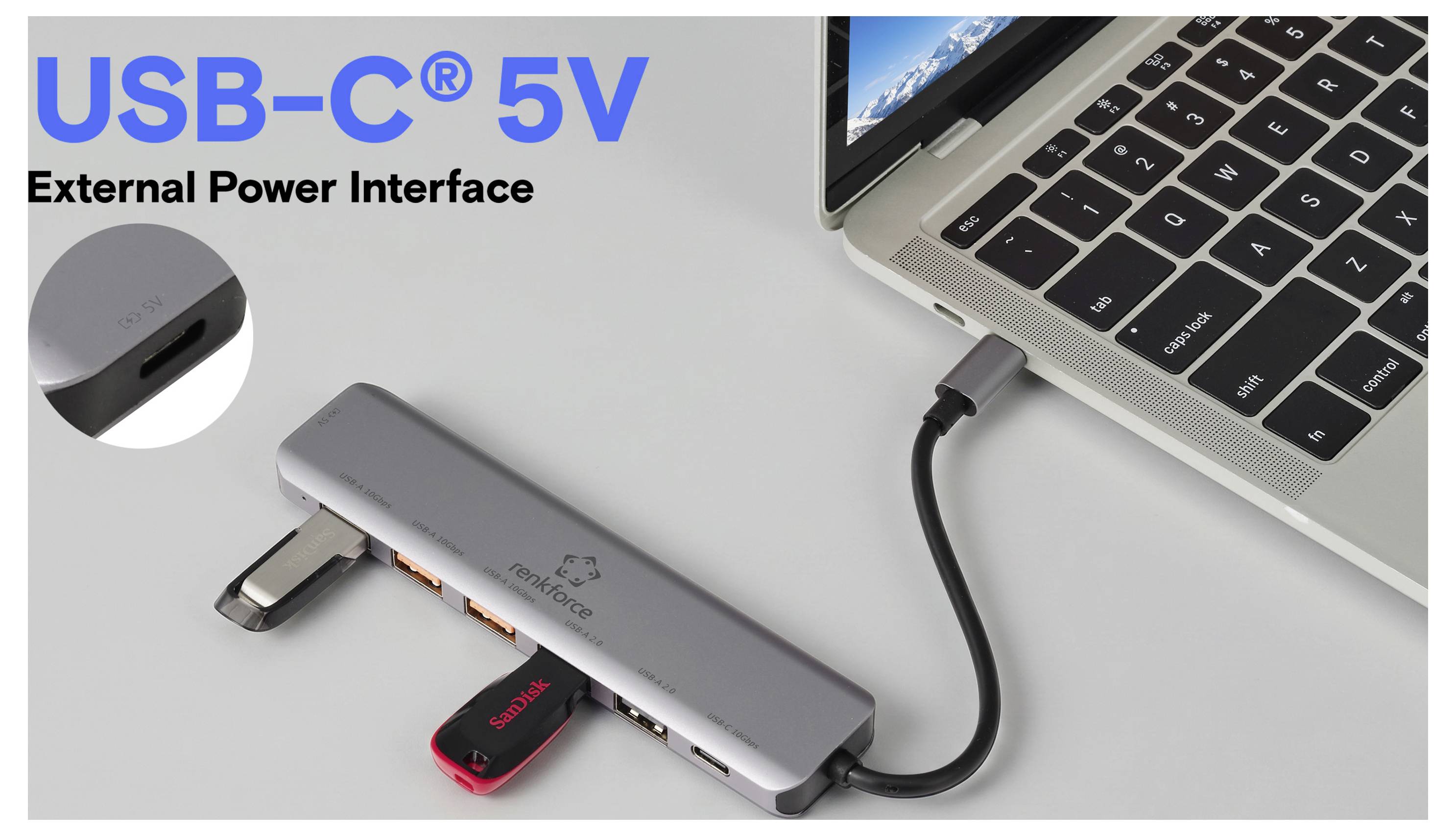 USB-C 5V-Stromversorgungsschnittstelle, die einen Laptop über einen Multi-Port-Hub mit angeschlossenen USB-Geräten mit Strom versorgt.