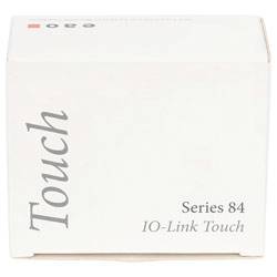 Eine weiße Box mit dem Text „Touch" auf der Seite und „Series 84 IO-Link Touch" auf der Vorderseite, was die Serie und den Typ des Produkts anzeigt.