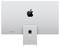 Rückansicht eines Apple iMac, die das Apple-Logo und Konnektivitätsanschlüsse auf einem silbernen Ständer zeigt.