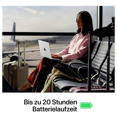 Reisende Frau mit Laptop am Flughafen; darunter steht 'Bis zu 20 Stunden Batterielaufzeit' mit Akkusymbol.