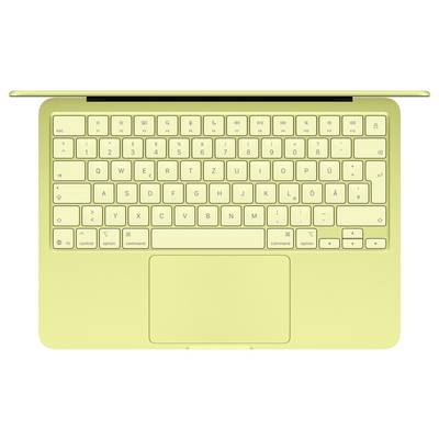 'Übersichtsaufnahme einer gelben Laptop-Tastatur und eines Trackpads auf einem passenden Laptop-Gehäuse.'