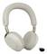 Beige Over-Ear-Kopfhörer mit passendem USB-Wireless-Dongle auf weißem Hintergrund.