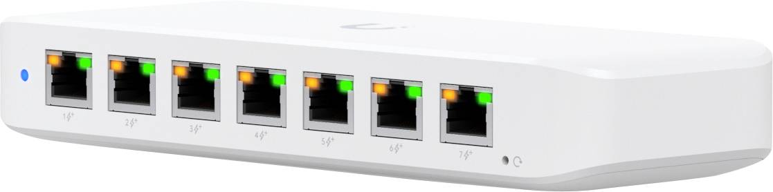 Ein weißer Netzwerk-Switch mit acht Ethernet-Anschlüssen, von denen jeder grüne und orangefarbene LEDs anzeigt, die den Verbindungsstatus und die Aktivitätsanzeige angeben.