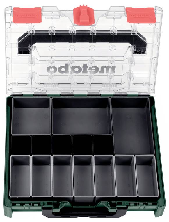Eine klare Kunststoffwerkzeugbox mit schwarzem Griff und "metabo"-Logo, die verschiedene leere schwarze rechteckige Fächer zur Werkzeugorganisation enthält.