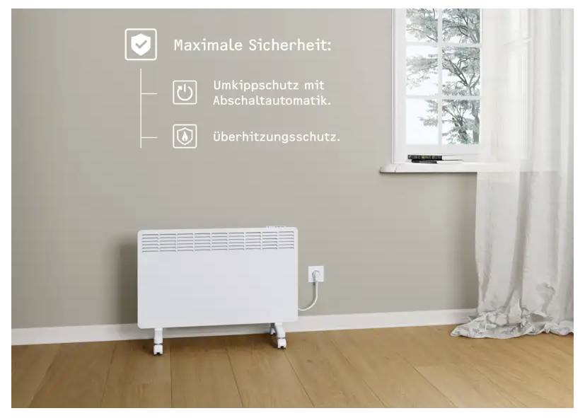 Ein weißer Platzheizer auf einem Holzboden ist in eine Wandsteckdose eingestöpselt; der Text liest sich „Maximale Sicherheit" mit einer Auflistung von Sicherheitsmerkmalen in Deutscher Sprache.