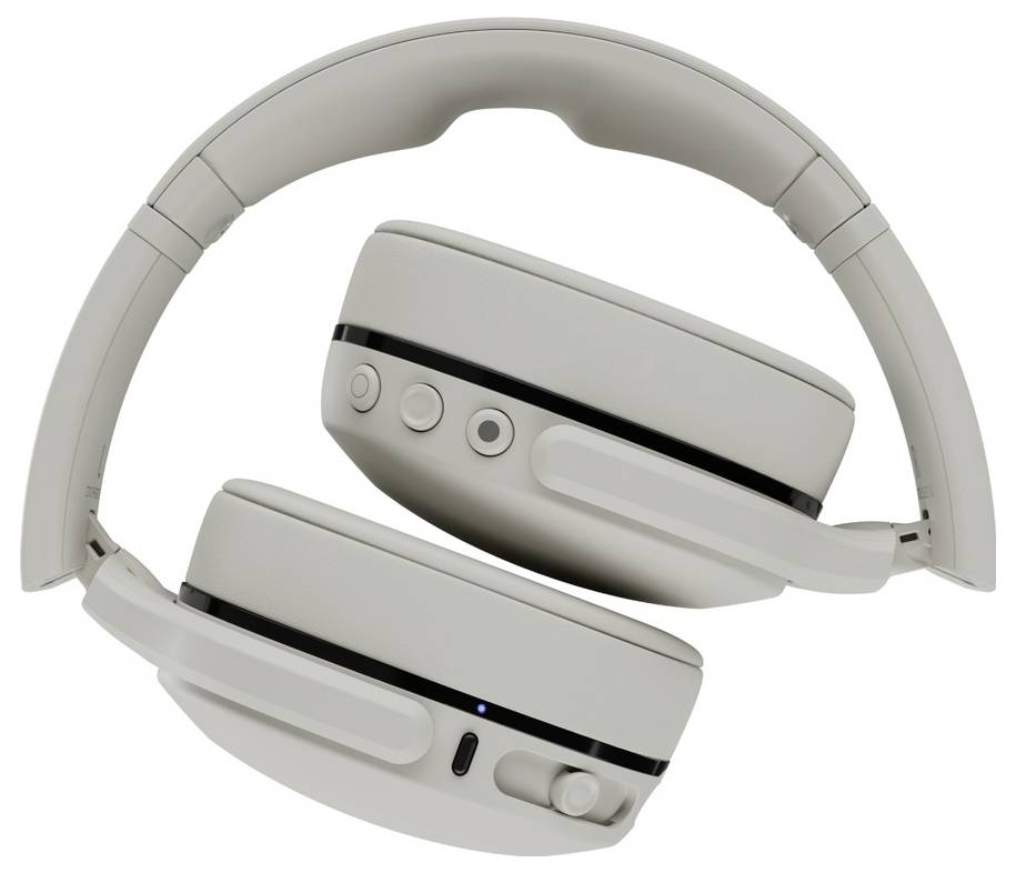 Gefaltete weiße Over-Ear-Kopfhörer mit sichtbaren Tasten und einem Ladeanschluss.