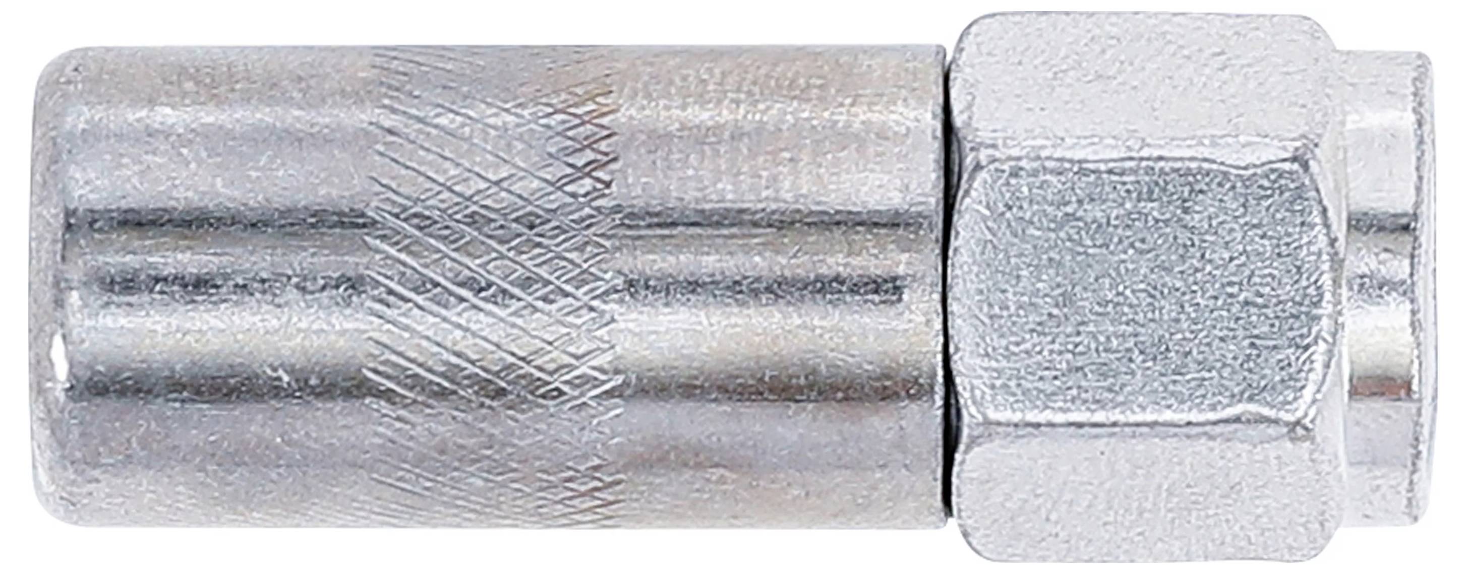 Ein Nahaufnahmebild eines metallischen zylindrischen Objekts mit einer strukturierten Oberfläche auf der einen Seite und einer sechskantigen Schraube auf der anderen Seite, möglicherweise ein mechanisches Bauteil.