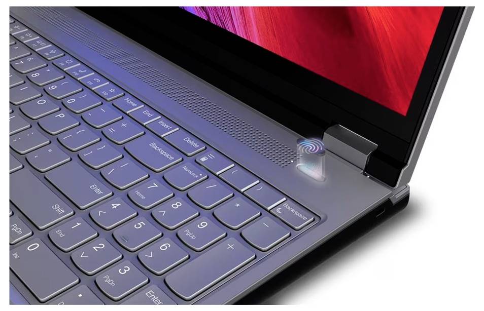 Nahaufnahme einer Laptop-Tastatur und eines Scharniers mit einem leuchtenden Fingerabdruckleser für biometrische Anmeldung.