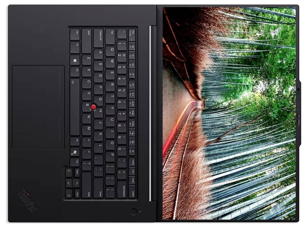Ein Laptop, auf dem Lagerverwaltungssoftware mit einer Lagergangsicht, Datentafeln, Protokollen und Code auf dem Bildschirm angezeigt wird.
