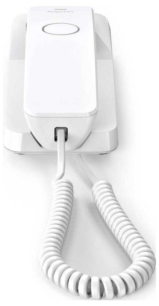 Ein weißes Schnurtelefon mit einem gewundenen Kabel, das auf einer Oberfläche ruht, von vorne betrachtet.