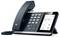 Yealink HD-Telefon auf einem Ständer mit Tastatur, Anzeigebildschirm zeigt „20:30 Uhr" und Telefonsymbole.