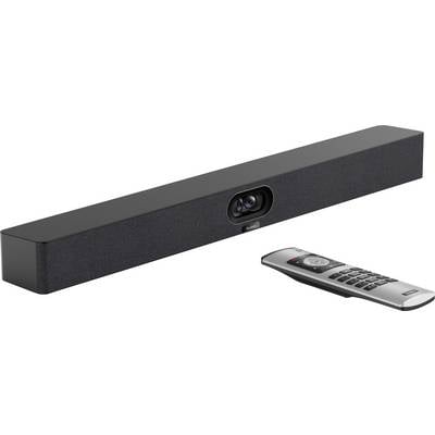 Eine schwarze Soundbar mit einem zentralen Kameraobjektiv sitzt auf weißem Hintergrund neben einer silbernen Fernbedienung mit mehreren Tasten.