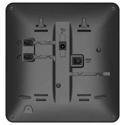 Rückansicht eines dunklen quadratischen elektronischen Geräts mit verschiedenen Anschlüssen für Netzwerkkabel und Wandmontage-Aussparungen. Keine sichtbaren Beschriftungen oder Markierungen.