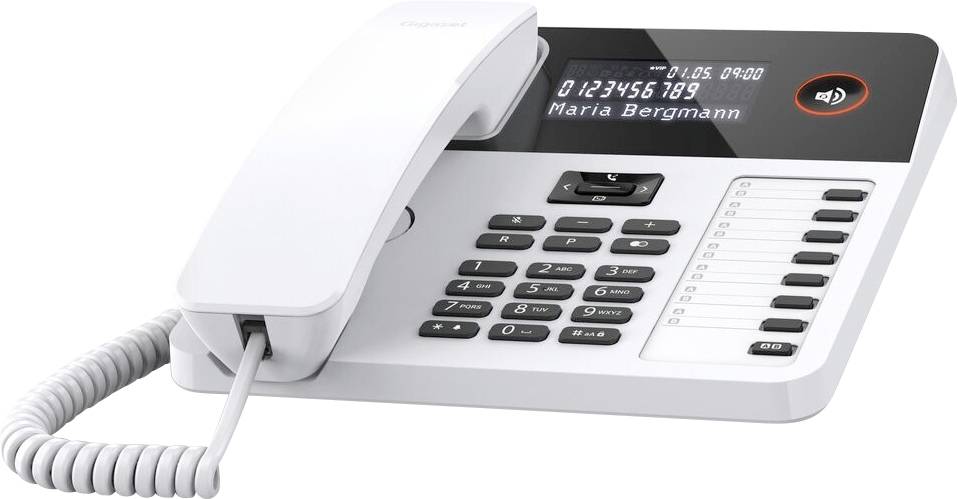 Ein weißes Schnurtelefon mit digitalem Display zeigt '0123456789 Maria Bergmann' an. Es hat ein Nummernfeld und Funktionstasten.