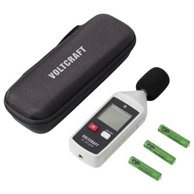 Voltcraft Schallpegelmessgerät mit Schaum-Mikrofon, Tragetasche und drei Batterien auf weißem Hintergrund.