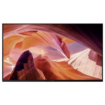 Ein großer Flachbildfernseher auf einem Ständer, in Vorderansicht mit einem leeren schwarzen Bildschirm dargestellt.