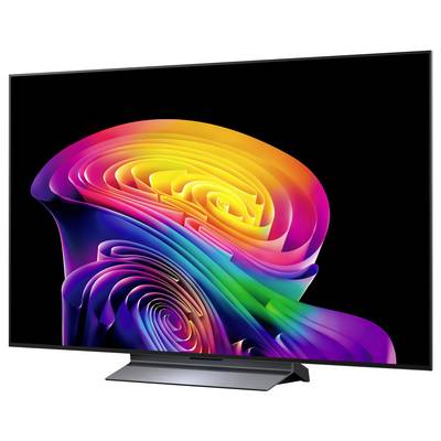 Ein eleganter Flachbildfernseher zeigt ein lebendiges abstraktes Regenbogenmuster auf schwarzem Hintergrund.