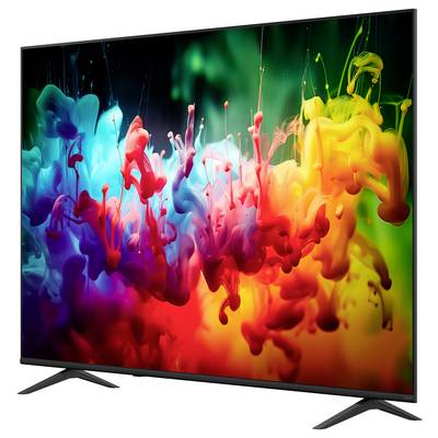 Flach-Bildschirm-Fernseher mit lebhaftem Regenbogen-Tinte-Spritzer abstraktem Bild auf schwarzem Hintergrund, auf angewinkelte Standfüße gestellt gezeigt.