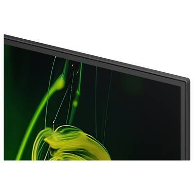 Nahaufnahme eines Flachbildschirms, der abstrakte grüne und gelbe Lichtspuren auf schwarzem Hintergrund zeigt.