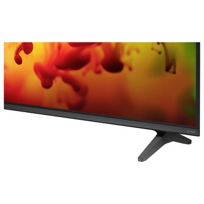 Flacher LG OLED-Fernseher auf Ständer mit farbenfrohem abstraktem rot-orange Bild.