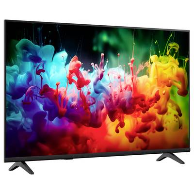 Flachbildfernseher zeigt einen farbenfrohen abstrakten Spritzer aus tintenähnlicher Farbe auf dunklem Hintergrund, mit Regenbogentönen über den gesamten Bildschirm verteilt.