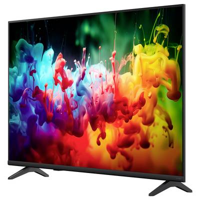 Ein Flachbildfernseher zeigt einen lebendigen abstrakten Regenbogen-Tintenspritzer auf schwarzem Hintergrund.