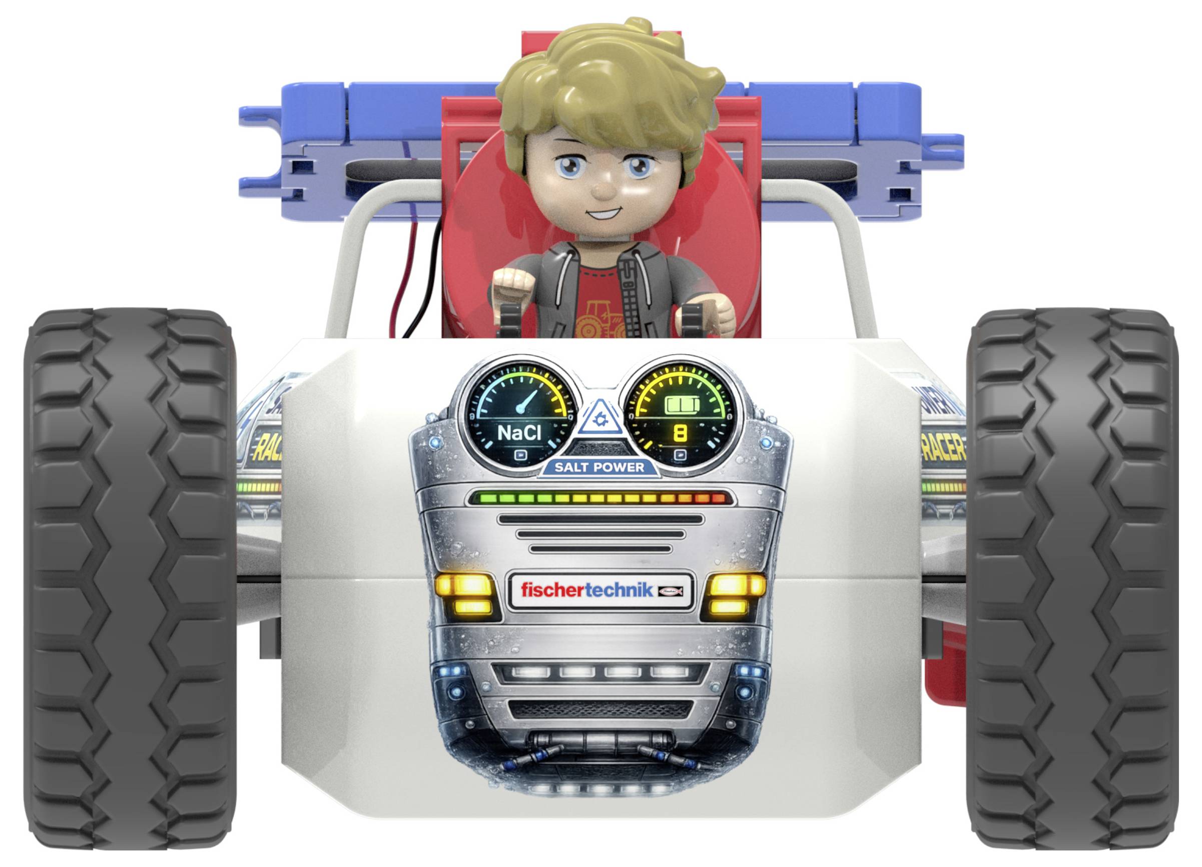Spielzeug-Offroad-Rennwagen mit übergroßen Reifen und einer lächelnden Fahrerfigur im Cockpit; das vordere Armaturenbrett zeigt „fischertechnik" und „SALT POWER".