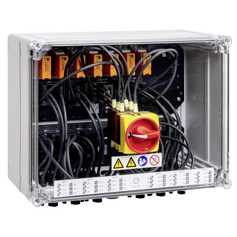 Elektrischer Schaltschrank mit Verdrahtung, Anschlussmodulen und einem prominenten rot/gelben Dreh-Sicherheitstrennschalter in einem durchsichtigen Schutzgehäuse.