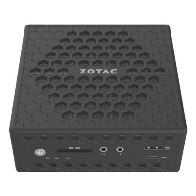 Kompakter schwarzer Zotac Mini-PC mit Zotac-Logo auf der Oberseite, Sechskant-Lüftungsmuster und Indikatoren für Stromversorgung, Audio, USB und Anschlüsse auf der Vorderseite.