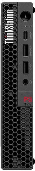 Frontansicht eines winzigen schwarzen ThinkStation P3 Desktops mit Wabengitter, Netztaste, USB-Anschlüssen und rotem ThinkStation P3 Tiny Branding.