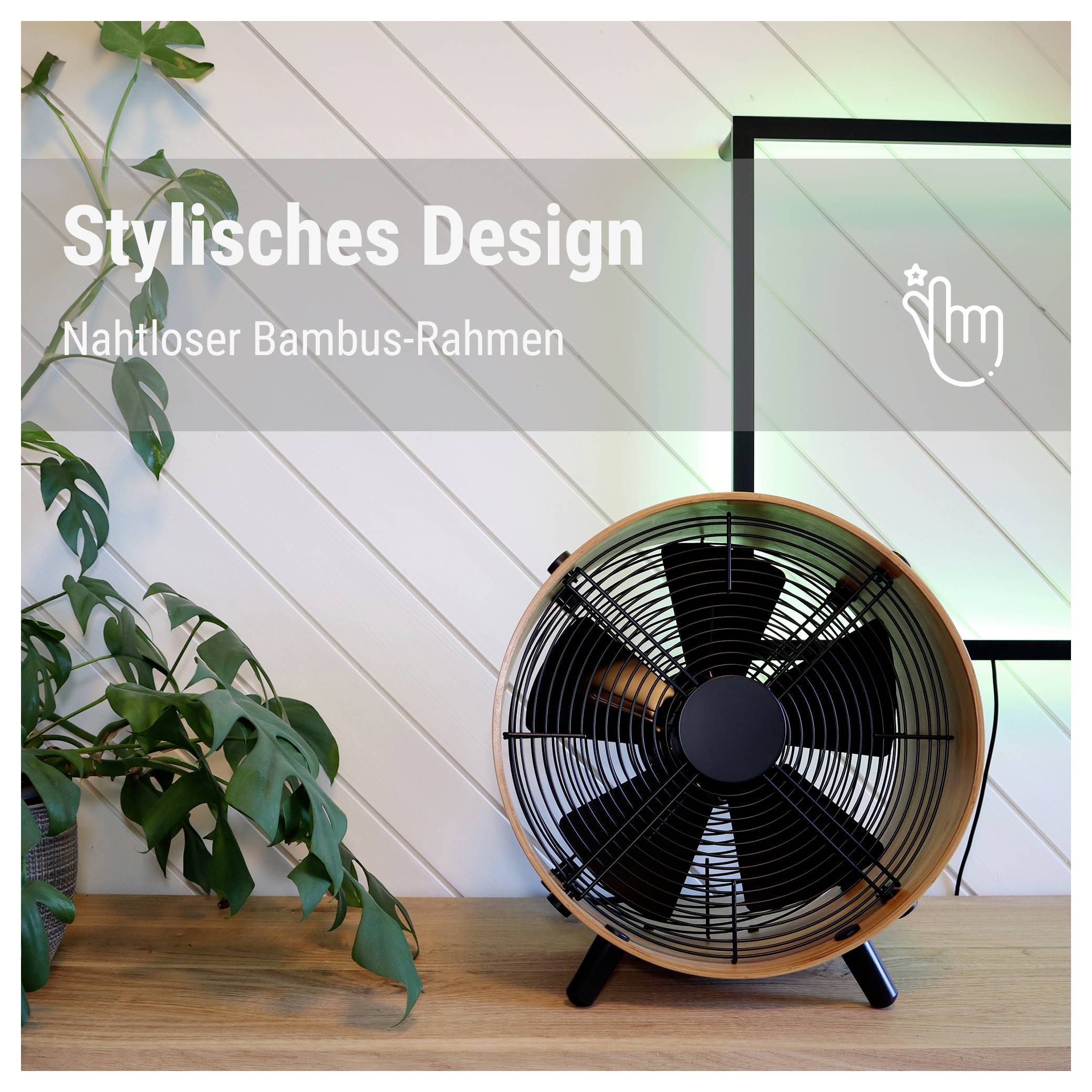Werbebild eines Tischventilators mit Holzrahmen vor heller Wand und Pflanze; Text: 'Stilishes Design' und 'Nahtloser Bambus-Rahmen'.