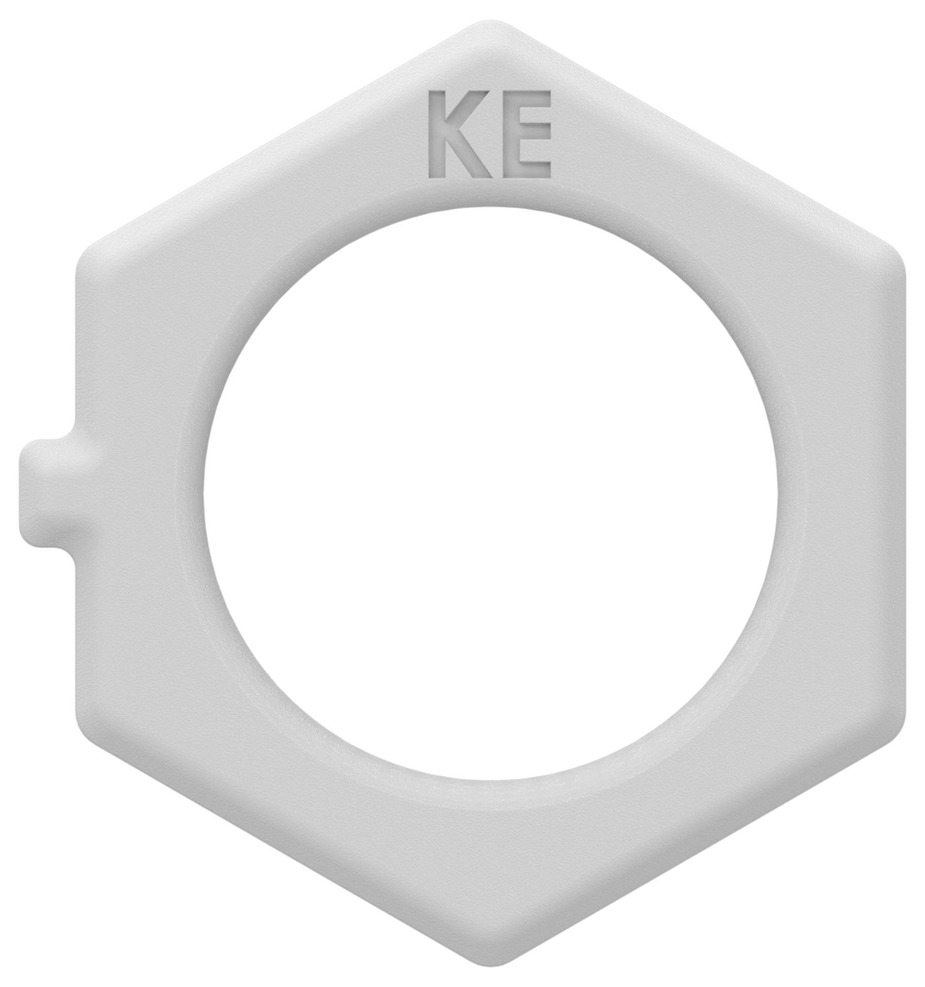 Grauer Kunststoffring in Sechskantform mit großem mittleren Loch und den Buchstaben „KE" oben eingeprägt, ähnlich einer Mutter oder Kappe.