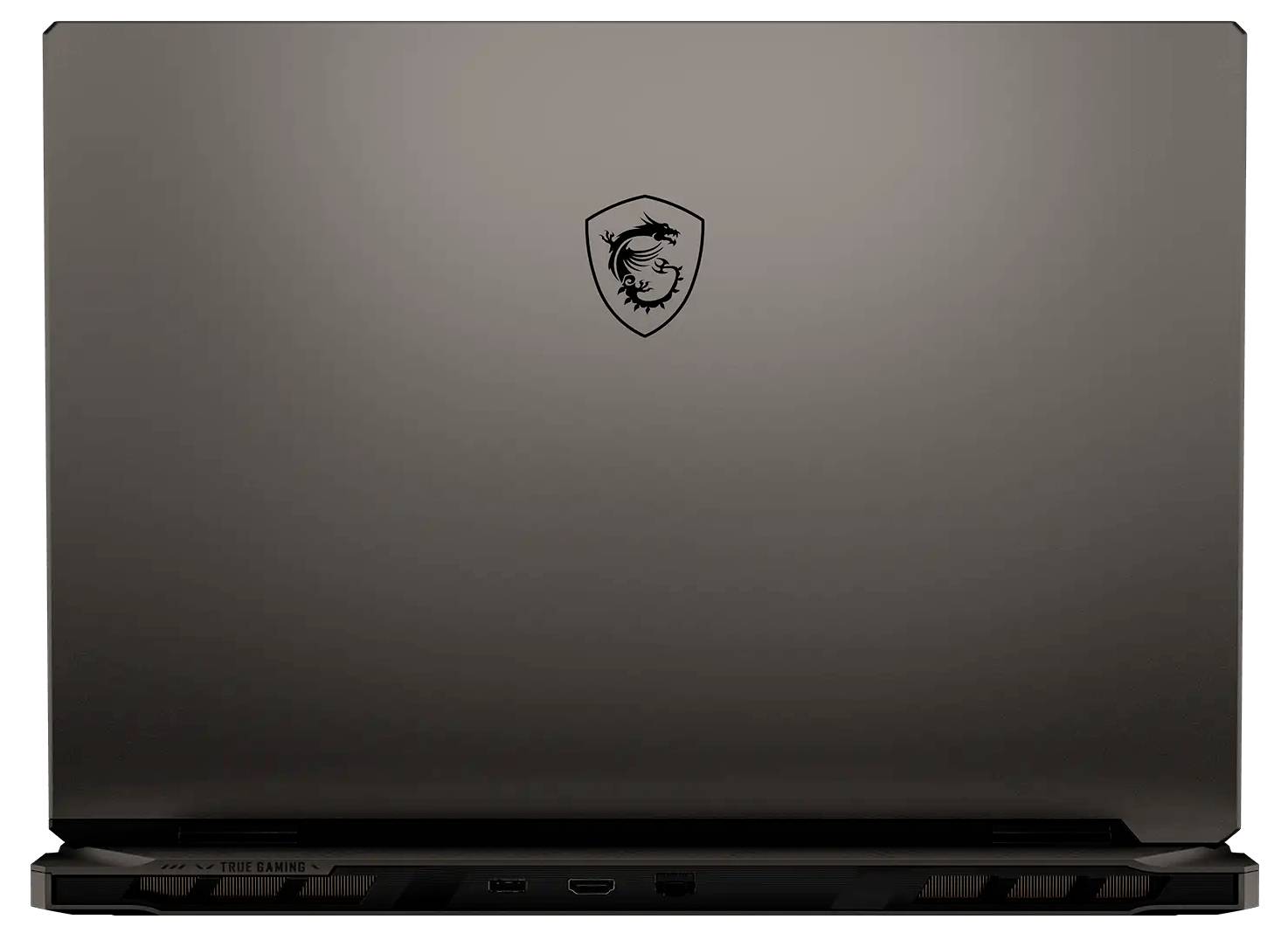 Zugeklappter MSI-Laptop, Vorderansicht, grauer Deckel mit zentriertem Drachen-Schild-Logo und sichtbaren vorderen Anschlüssen entlang der unteren Kante.