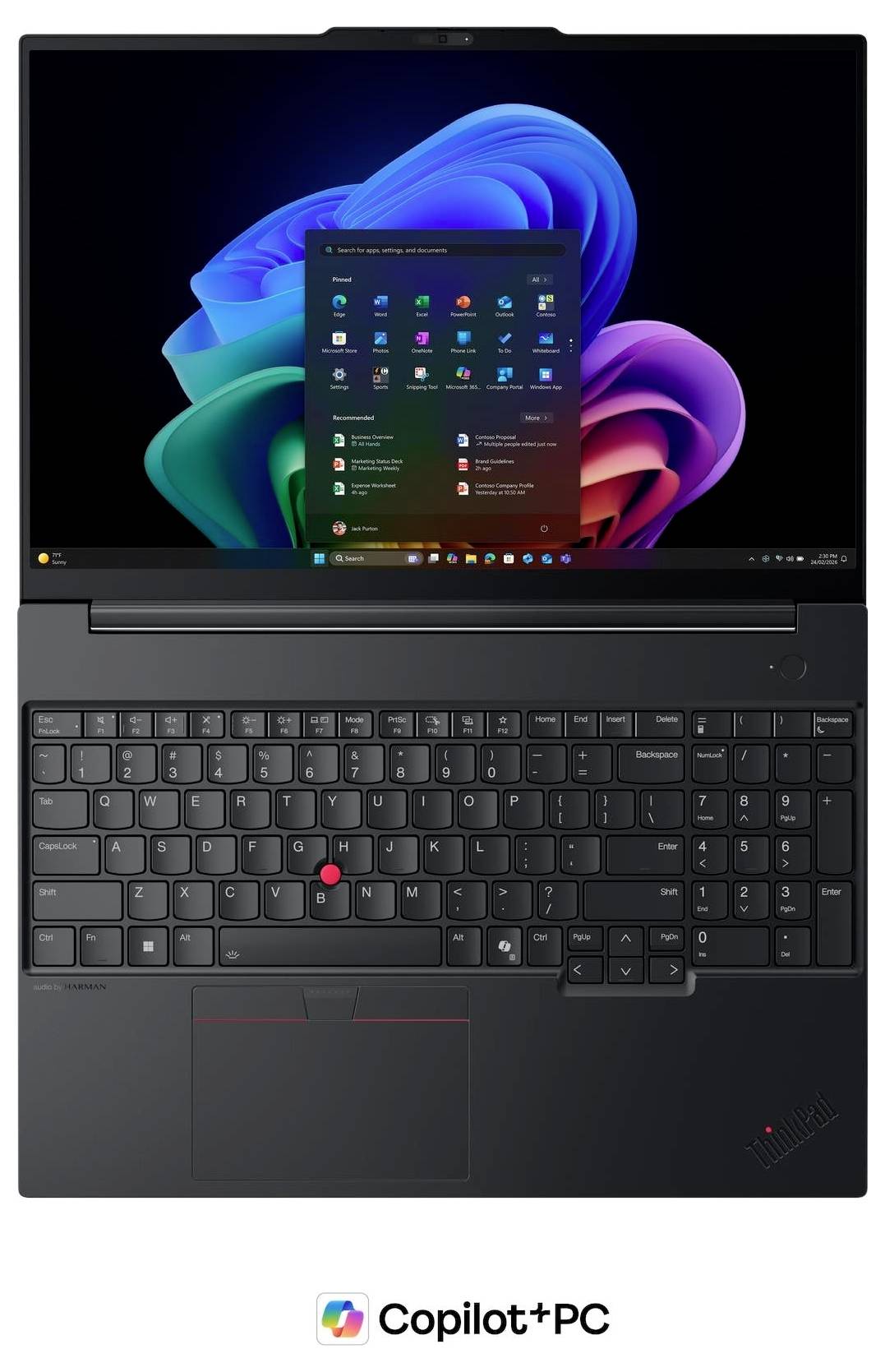 Vorderansicht eines Lenovo ThinkPad-Laptops mit dem Windows 11-Startmenü auf dem Bildschirm, sichtbarer Tastatur und rotem TrackPoint; „Copilot+ PC"-Branding darunter.