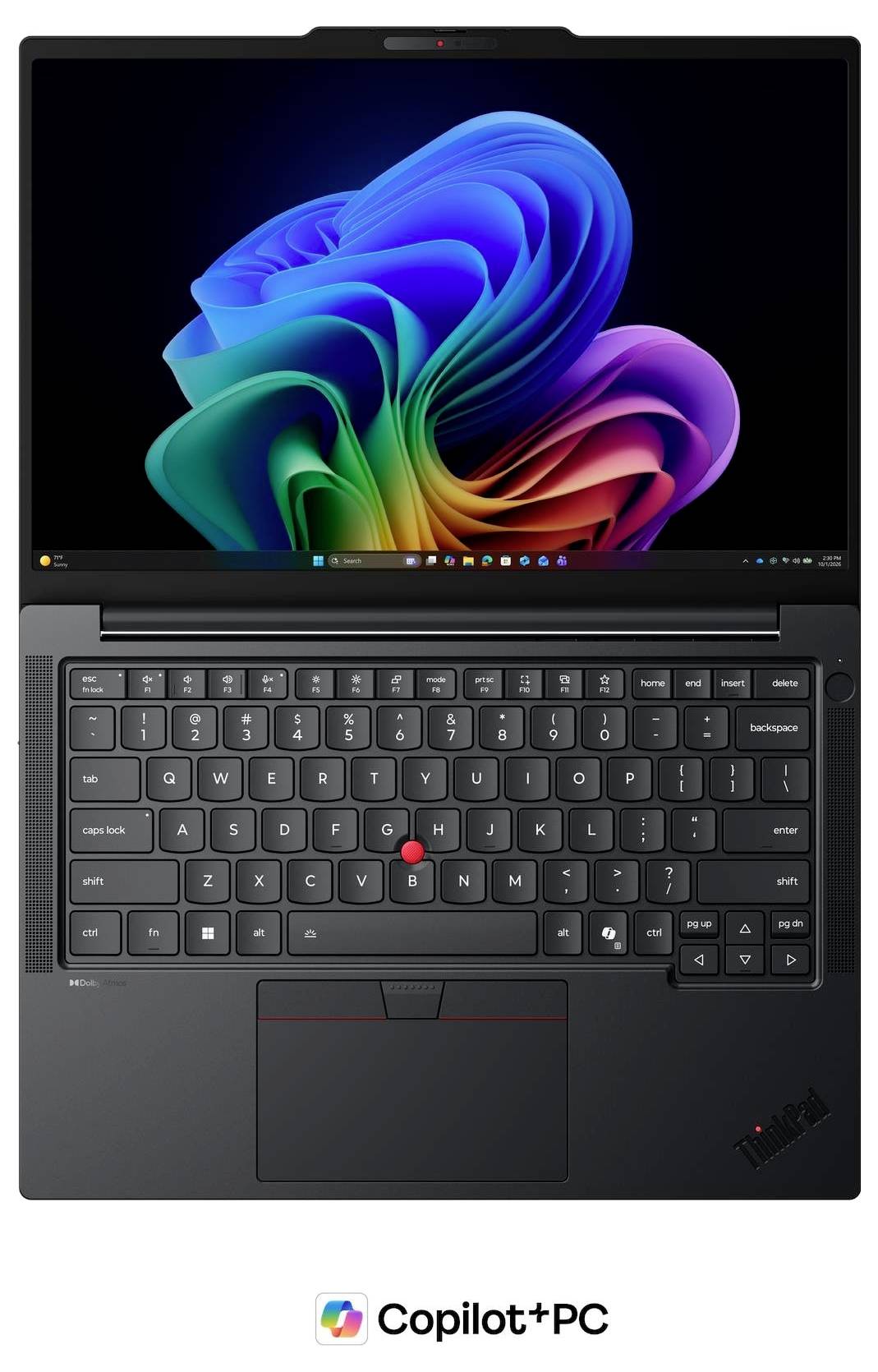 Draufsicht eines Lenovo ThinkPad-Laptops mit dem Windows-Desktop; Tastatur und Touchpad sind sichtbar, darunter das Copilot+ PC-Logo.