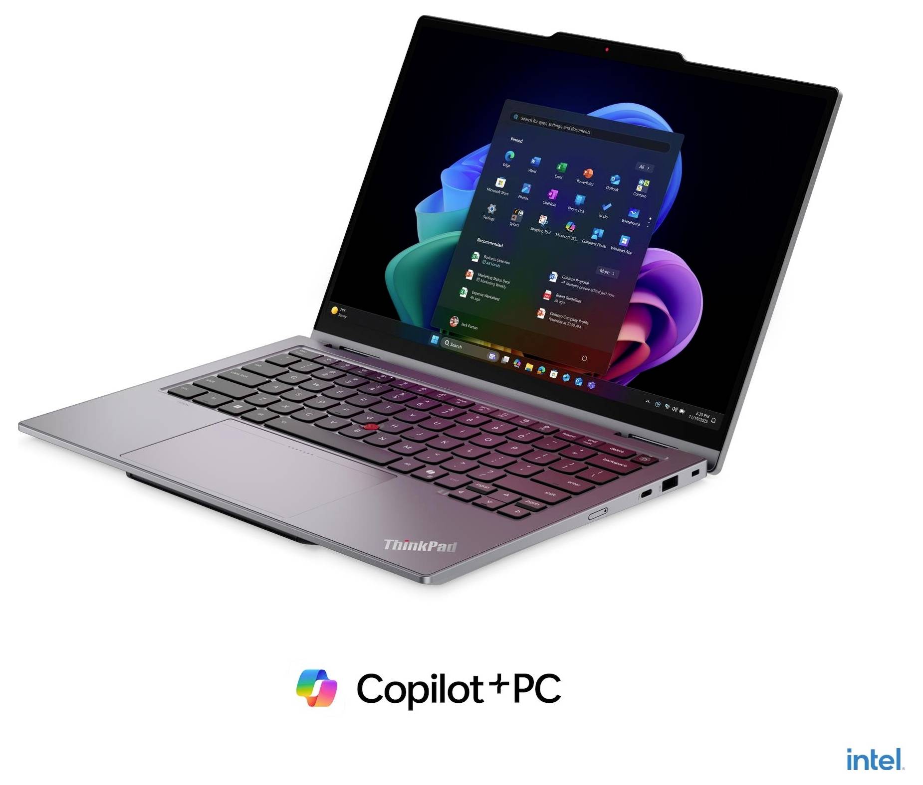 Draufsicht auf einen ThinkPad-Laptop, der den Windows-11-Desktop und ein „Copilot+PC"-Label darunter zeigt, mit dem roten TrackPoint in der Mitte der Tastatur.