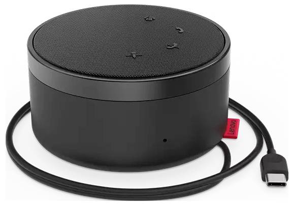 Schwarzes rundes Tabletop-Gerät mit USB-C-Kabel, wahrscheinlich ein Lautsprecher oder Mikrofon-Puck, auf weißem Hintergrund gezeigt.