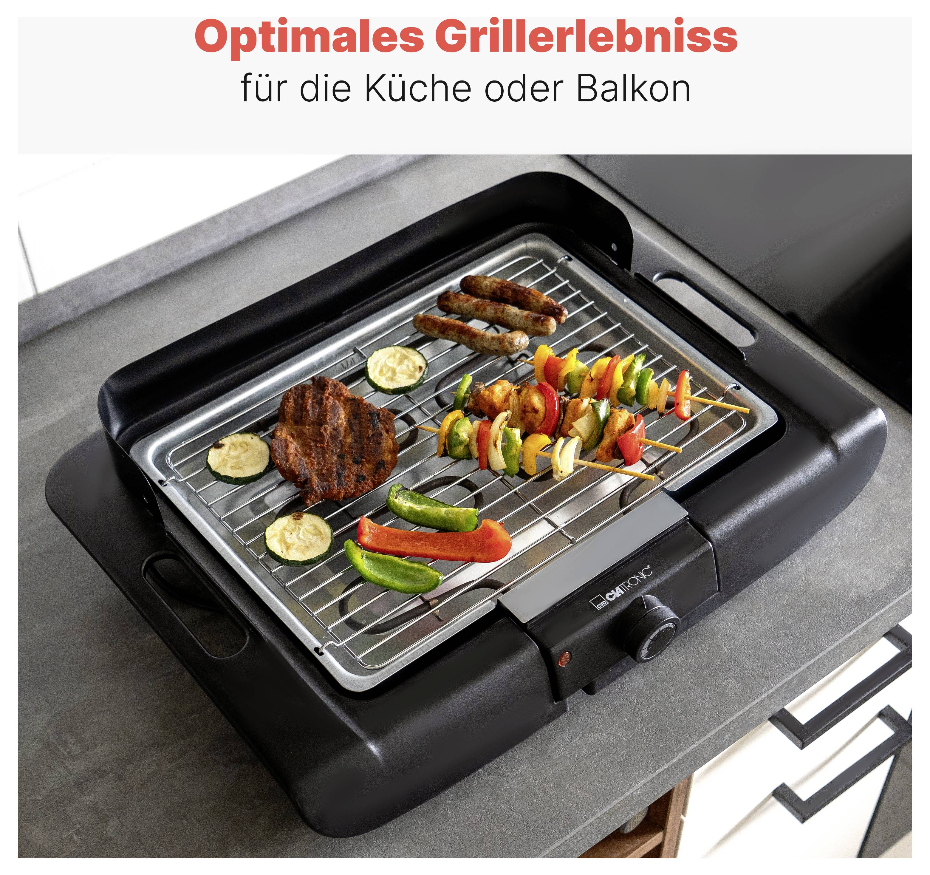 Elektrischer Tischgrill mit Fleisch, Würstchen und Gemüsespießen; Text oben: 'Optimales Grillerlebnis für die Küche oder Balkon'.