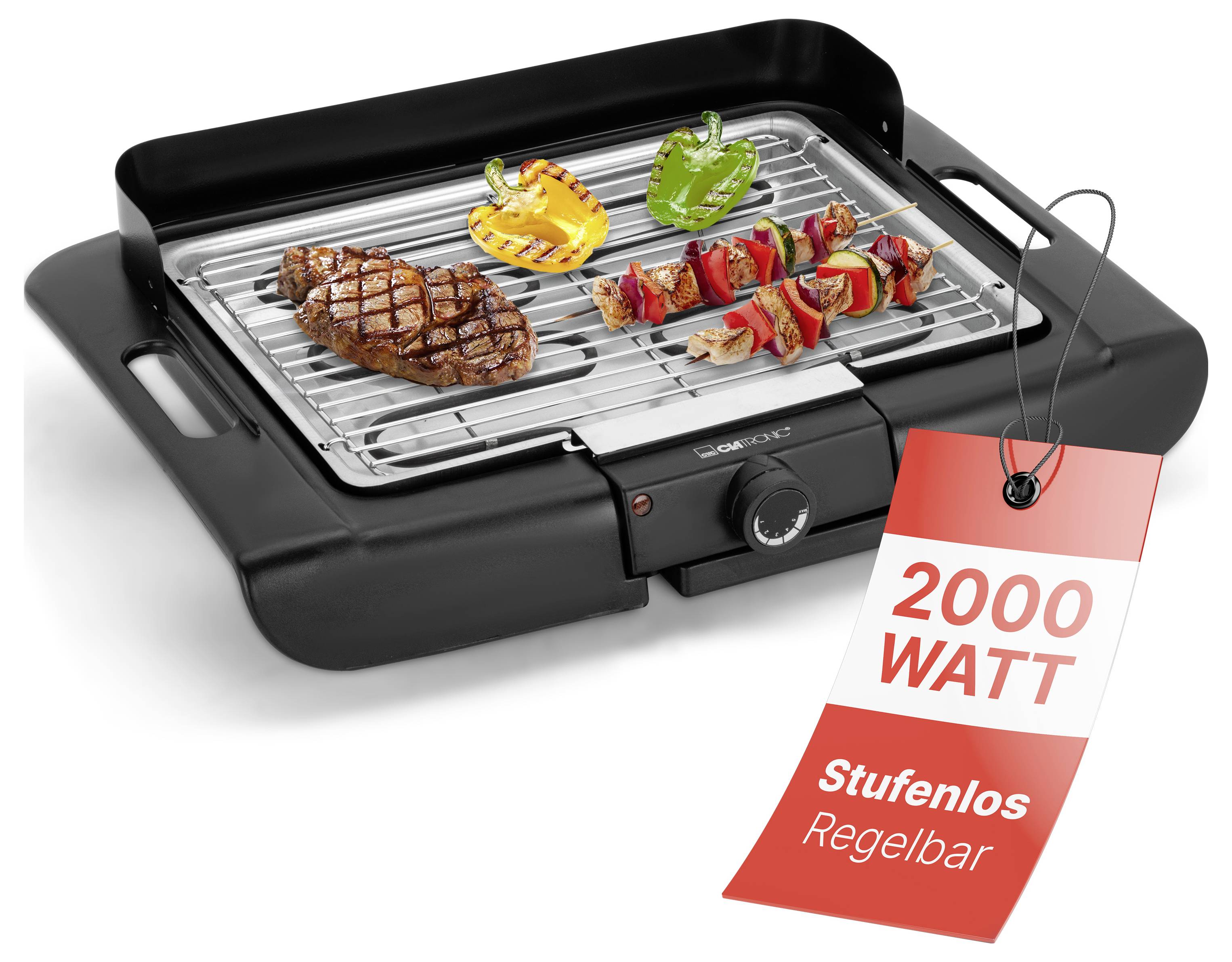 Elektrischer Tischgrill mit Steak, Gemüse und Spießen; Etikett wirbt mit '2000 WATT' und 'Stufenlos regelbar'.