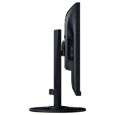 Seitenansicht eines schwarzen Computermonitors auf einem Ständer, die die Bildschirmdicke, den Montagearm und die seitlichen Anschlüsse zeigt.