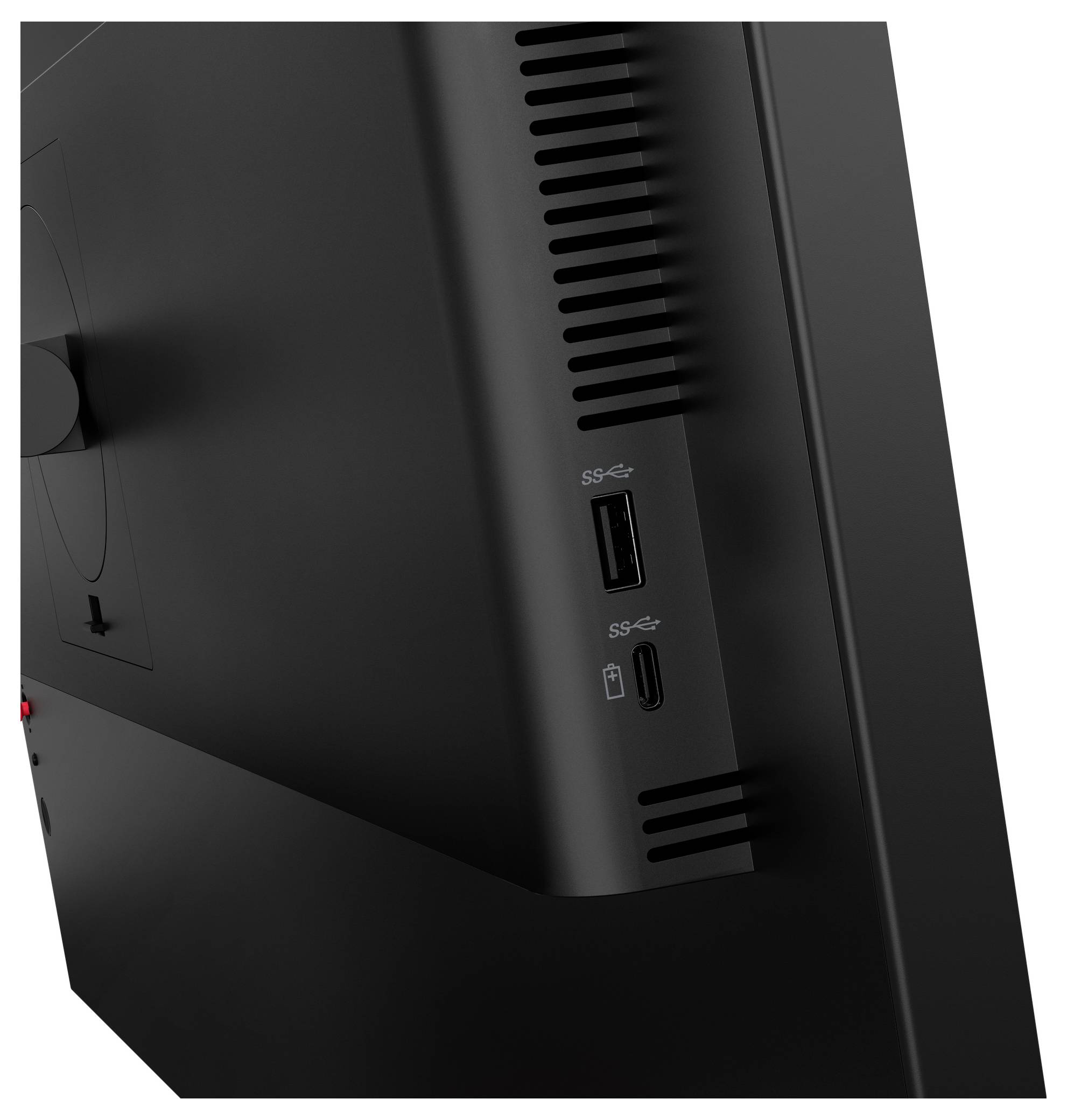 Nahaufnahme eines schwarzen Monitor- oder Geräteseiten panels mit einem USB-A-Anschluss und einem mit SS beschrifteten USB-C-Anschluss sowie Belüftungsschlitzen.
