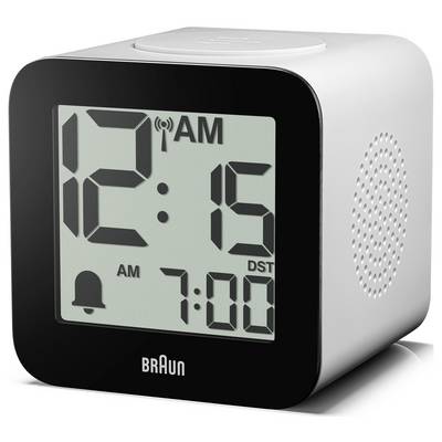Digitale Braun-Wecker zeigt 12:15 Uhr nachts und 7:00 Uhr Alarmzeit an, mit AM- und Sommerzeit-Indikatoren und Lautsprechergitter an der Seite.
