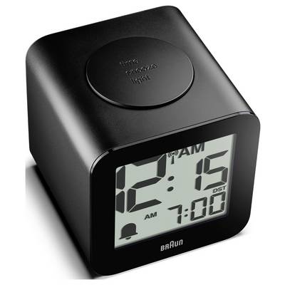 Schwarze Braun Digitalwecker, die 12:15 Uhr morgens anzeigt, mit Alarm auf 7:00 Uhr eingestellt und Sommerzeit-Anzeige; runder oberer Schlummertaste.